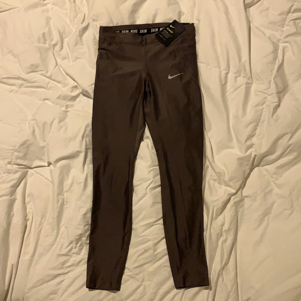 The Nike Speed Tight Fit copper 7/8 length legging